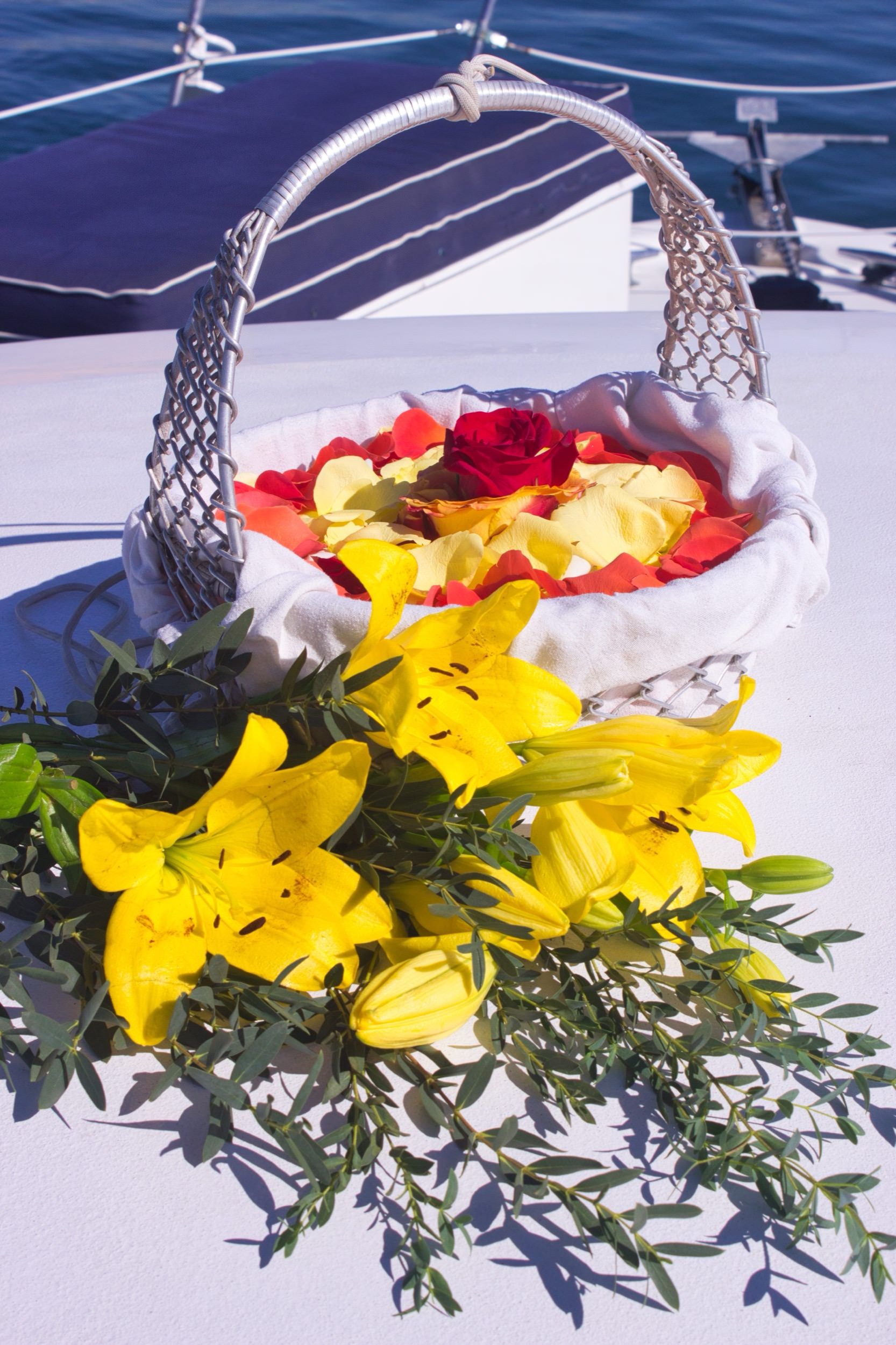A basket lined with lilies, prepared for scattering